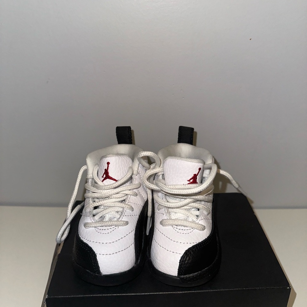 Jordan 12 retro “Taxis”. Size: 4c. Great condition.
